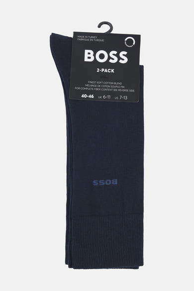 Chaussettes courtes bleu marine de BOSS ORANGE, avec le logo de la marque foncé sur le côté.
