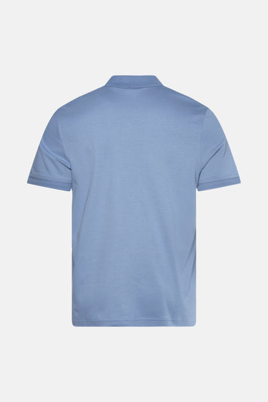Polo bleu à manches courtes de BOSS ORANGE, présentant un col classique et une texture subtile.