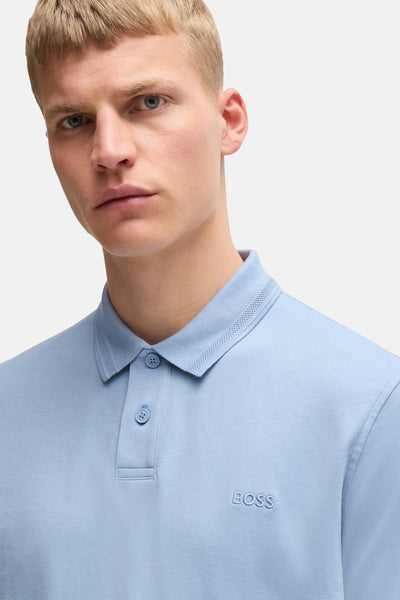 Polo bleu clair de BOSS ORANGE avec col à motif perforé et logo ton sur ton.
