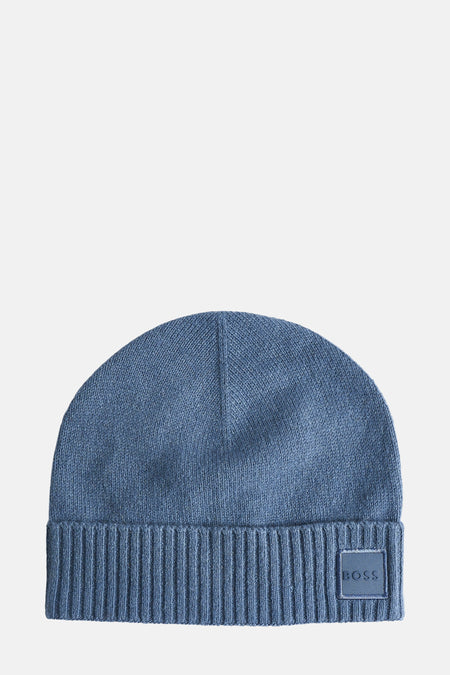 Blauwe tricotschap van BO OR ORANGE, met een korteel en een rechte patch logo.