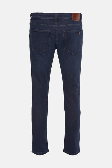 Jean slim en denim bleu foncé de BOSS ORANGE, avec poches arrière et étiquette en cuir.