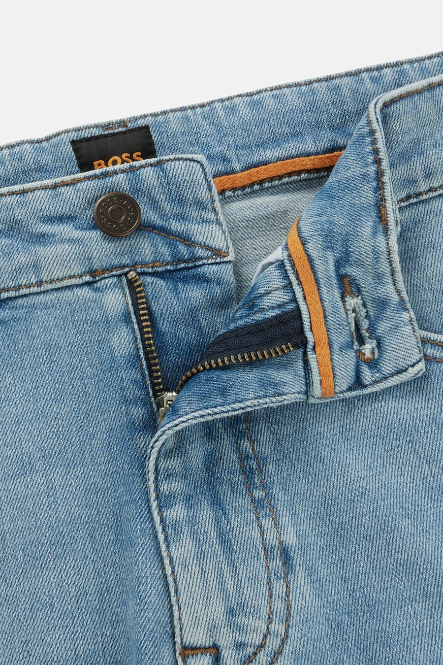 Jean slim en denim bleu clair de BOSS ORANGE, avec fermeture éclair apparente et bouton logotypé.
