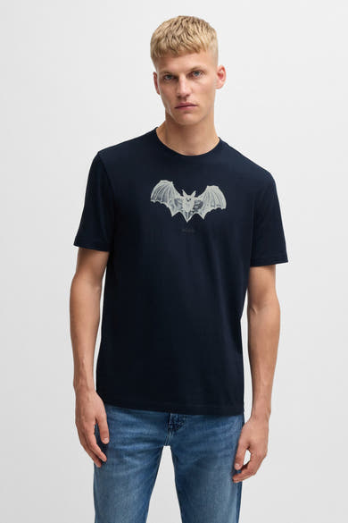 Blauw T-shirt met korte mouwen van BOSS ORANGE, met een witte vleermuisprint op de voorkant.