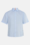 Chemise à manches courtes bleue de BOSS ORANGE, avec une rayure orange visible au niveau du cou.