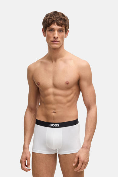 Boxer blanc de BOSS ORANGE, porté par un mannequin torse nu sur fond blanc.