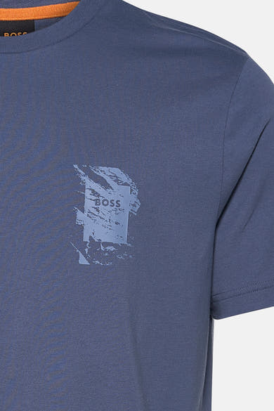 T-shirt à manches courtes bleu de BOSS ORANGE avec un imprimé graphique abstrait.