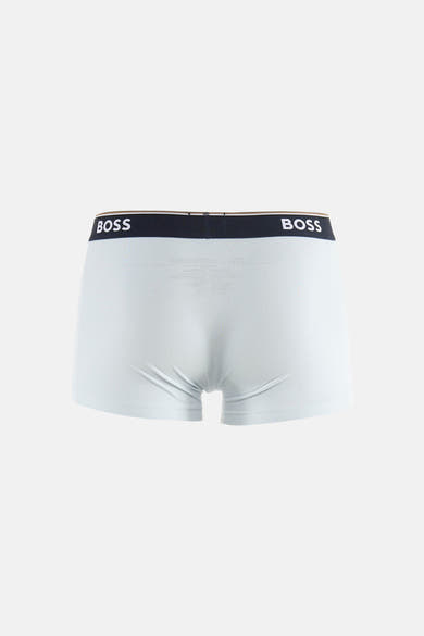 Light blue cotton boxers by BOSS with navy waistband featuring white logo, back view.