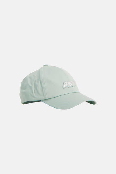 Casquette turquoise de BOSS ORANGE avec le logo 'BOSS' blanc en relief en vue de côté.