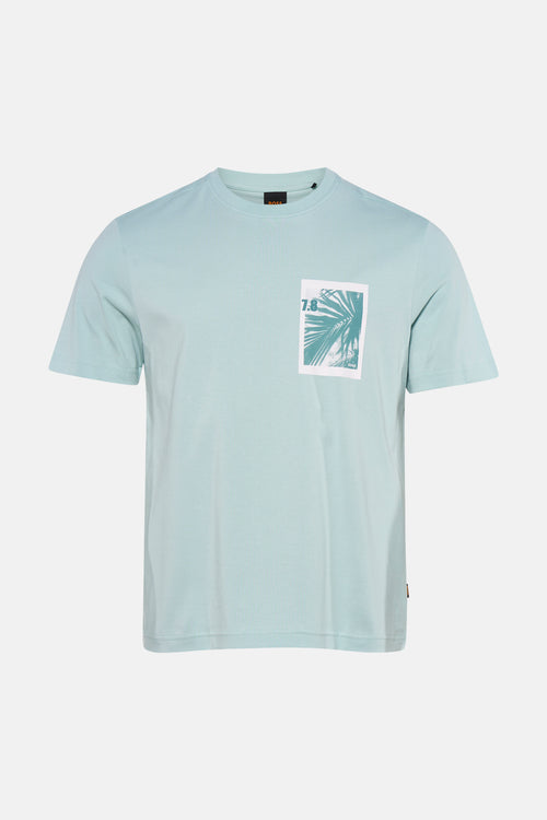 T-shirt à manches courtes turquoise clair de BOSS ORANGE avec un imprimé graphique de palmiers et 7.8 sur la poitrine.