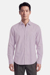 Chemise à manches longues rouge de BOSS ORANGE, en coton lisse, boutonnée, vue de face sur modèle portant pantalon gris
