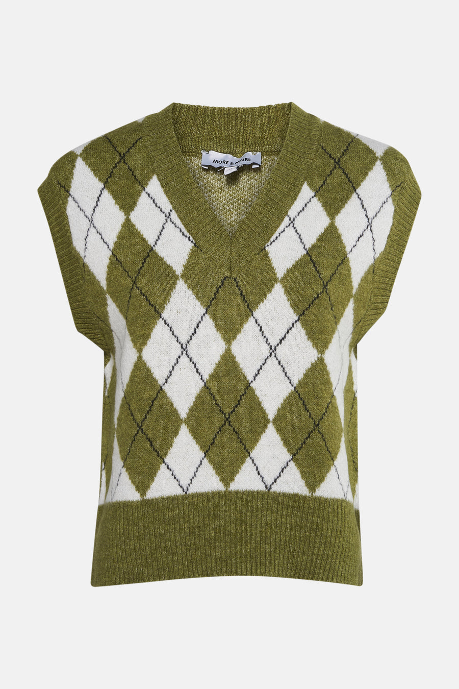 Groen gebreid hemdje van MORE & MORE, wit ruitpatroon en zwarte details, close-up.