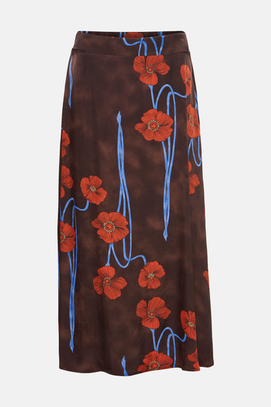 Multikleurige lange rok van MORE & MORE met rood bloemenpatroon en blauwe stelen.