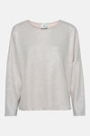 Top uni beige à manches longues de Terra di Siena, vêtement en maille fine brillante.