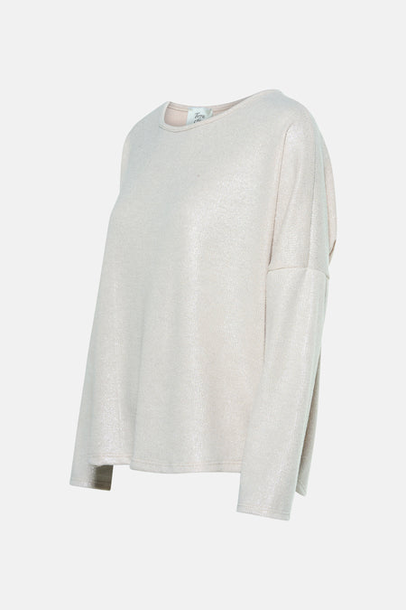 Top uni beige à manches longues de Terra di Siena avec une texture scintillante.