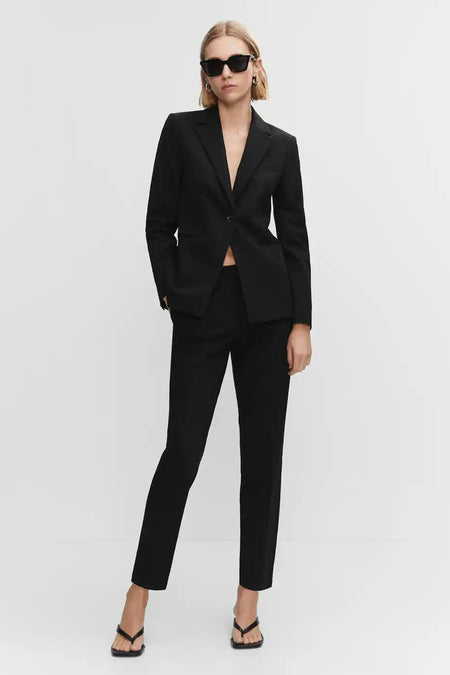 Black chinos with slim fit and straight leg, worn with matching blazer and black sandals, front view lifestyle shot