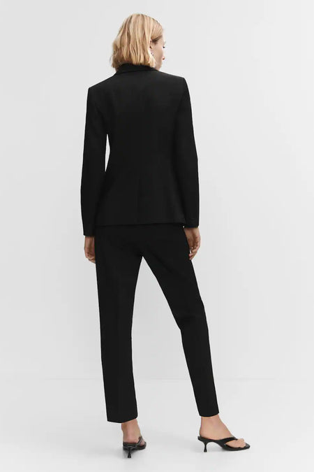 Black chinos with slim fit and straight leg, back view, worn with matching blazer and black heels