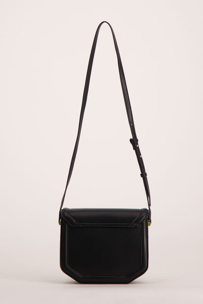 Black leather crossbody bag with flap closure and adjustable strap, front view