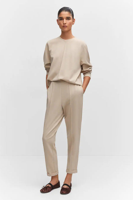 Pantalon color&eacute; - beige