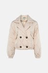 Ecru quilted double-breasted jacket by Terra Siena, featuring diamond stitching, four dark buttons, and elasticated cuffs, front view