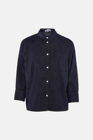 Chemise à manches longues en denim bleu foncé de MORE & MORE, avec boutons blancs et coutures contrastantes.