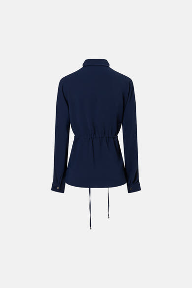 Gilet bleu de MORE & MORE, avec cordon de serrage à la taille, manches longues et fermeture boutonnée aux poignets.