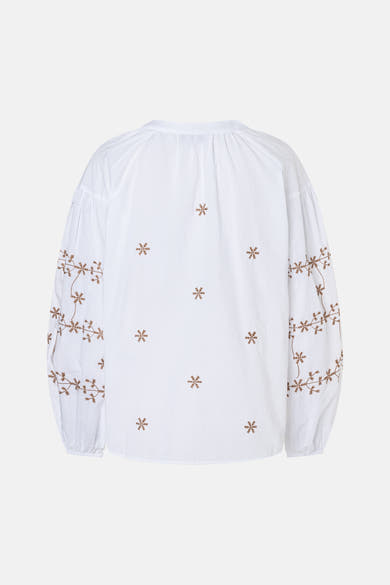 Wit MORE & MORE blouse met bruine geborduurde bloemenpatronen op de rug en mouwen, achterzijde.