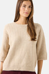 Beige ribbed knit sweater with round neckline by MORE & MORE, featuring textured herringbone pattern and three-quarter sleeves, shown front view on model.