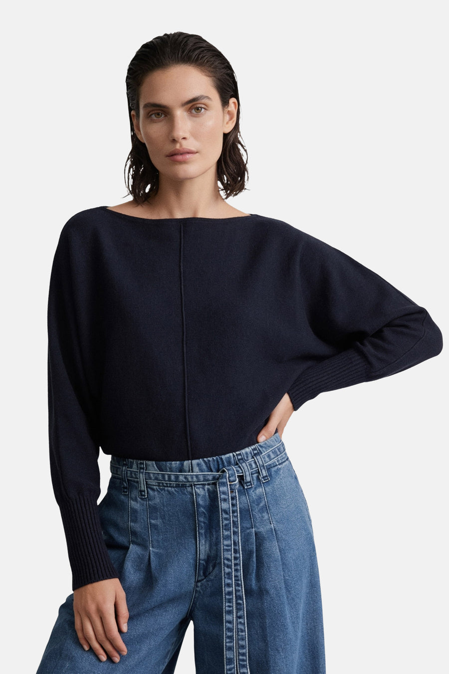 Navy blue round-neck sweater by MORE & MORE, featuring ribbed cuffs and a relaxed fit, worn with high-waisted jeans in a front lifestyle view.