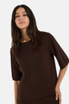 Brown ribbed knit round-neck pullover by MORE & MORE, three-quarter sleeves, front view on model