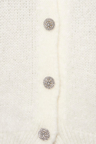Cardigan écru en maille duveteuse de Terra di Siena avec boutons décoratifs en strass.
