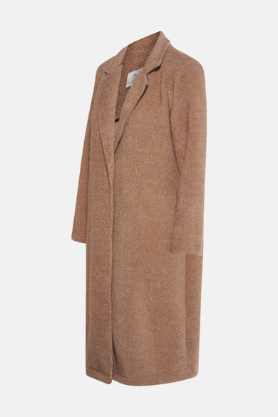 Veste longue beige de Terra di Siena avec une texture tweedée.