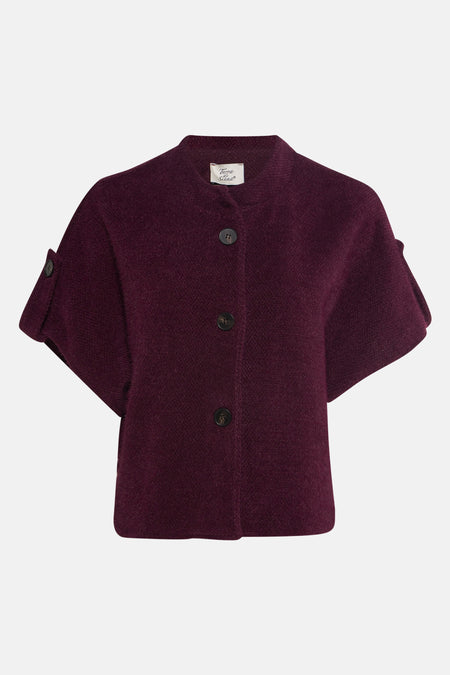 Cardigan bordeaux de Terra di Siena, coupe courte avec boutons et manches courtes à revers boutonnés.