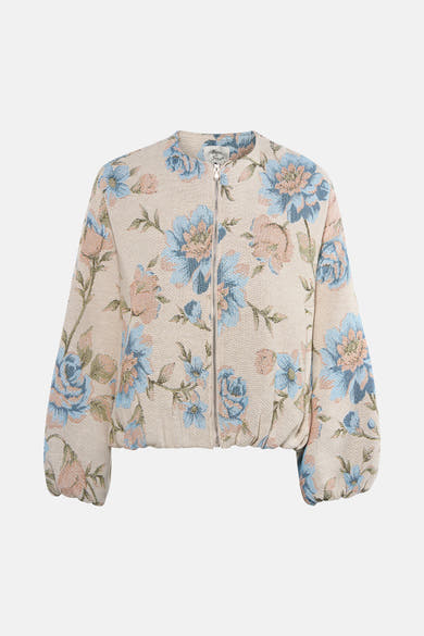 Korte meerkleurige jas van Terra di Siena, met blauw en perzik bloemenpatroon op een beige textuurachtergrond.