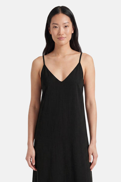 Black slip-style robe with thin straps and V-neck, front view on model