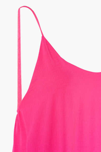 Bright pink midi robe with thin spaghetti straps, close-up side view showing smooth fabric texture