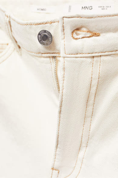 Korte beige short van MANGO, met ritssluiting en zilverkleurige knoop, contrasterende stiksels.