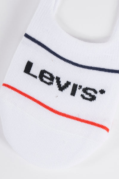 Socquette blanche par Levi's, avec rayures rouge et bleu marine, logo noir de la marque visible.