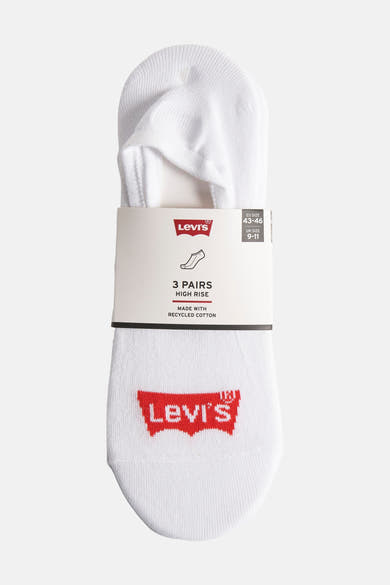 Chaussettes courtes blanches de Levi's® avec logo rouge et emballage cartonné.
