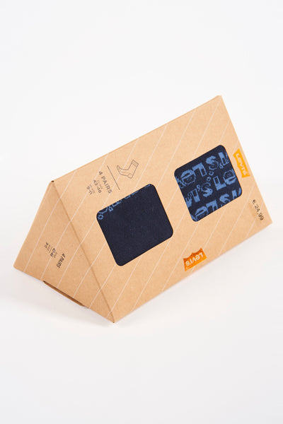 Coffret de chaussettes bleues de Levi's, avec des motifs, présentées dans une boîte en carton avec des rayures.
