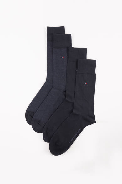 Chaussettes bleues unies de Tommy Jeans avec logo subtil sur le côté et différentes textures.