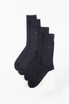 Chaussettes bleues unies de Tommy Jeans avec logo subtil sur le côté et différentes textures.