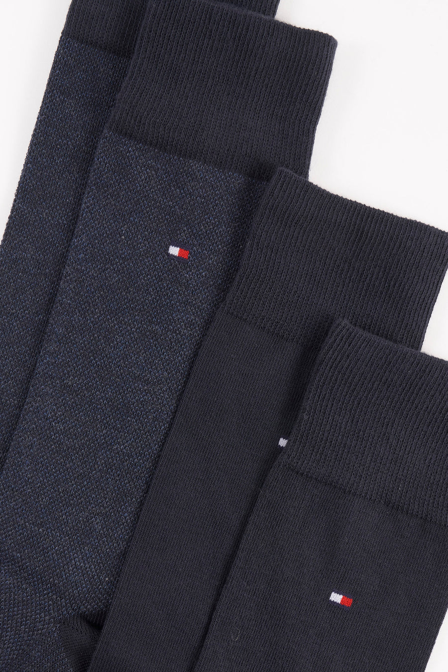 Chaussettes bleues de Tommy Jeans avec des motifs texturés et le logo emblématique de la marque brodé.
