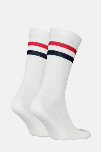 Witte sokken met rode en marineblauwe strepen van Levi's® Accessories, naast elkaar getoond.