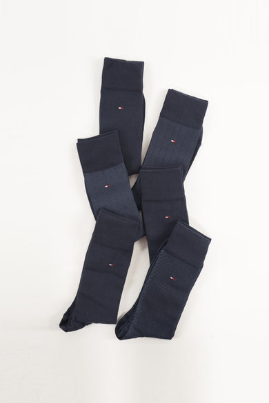 Chaussettes bleues de TOMMY JEANS, motifs variés, texture tricotée et logo subtil.