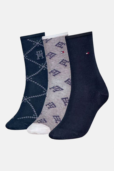 Chaussettes bleues à motifs variées de Tommy Jeans avec losanges et logos.
