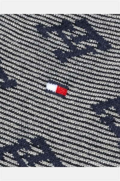 Blauw TOMMY JEANS cadeau met strepen en geometrisch patroon, iconisch logo detail.