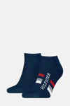 Chaussettes bleues de TOMMY JEANS avec le nom de la marque et des rayures décoratives.