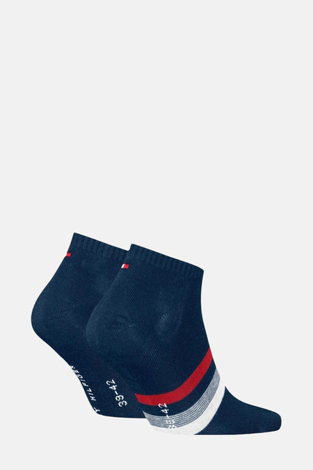 Chaussettes courtes bleues de TOMMY JEANS, rayures tricolores sur le devant et logo discret sur le bord.