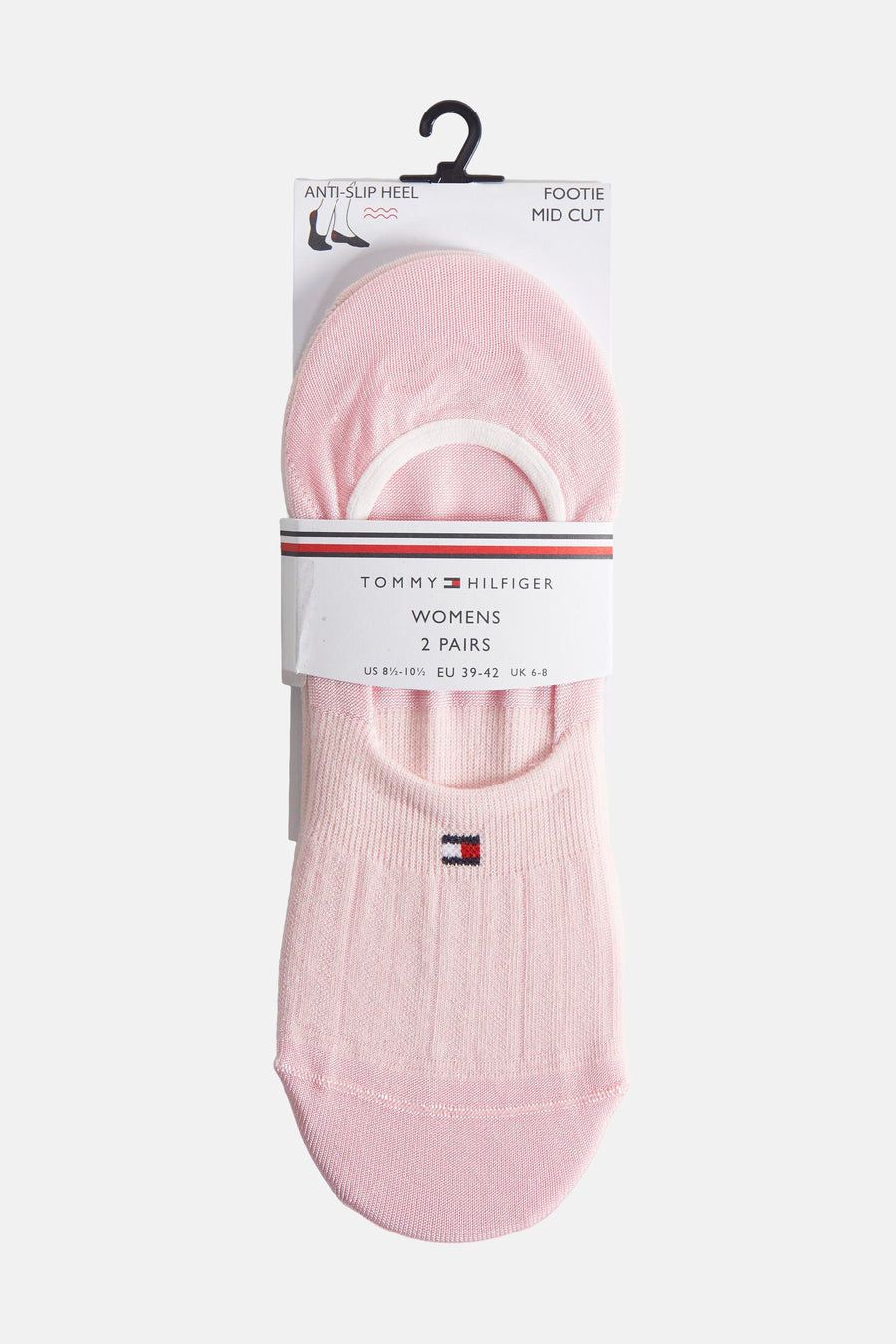 Chaussettes roses pour femmes de Tommy Hilfiger, avec motif côtelé et logo drapeau.