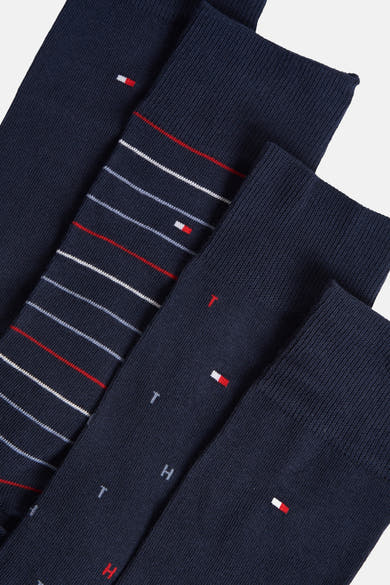 Chaussettes bleues en tricot par TOMMY JEANS, avec rayures, motifs de lettres et logo signature.